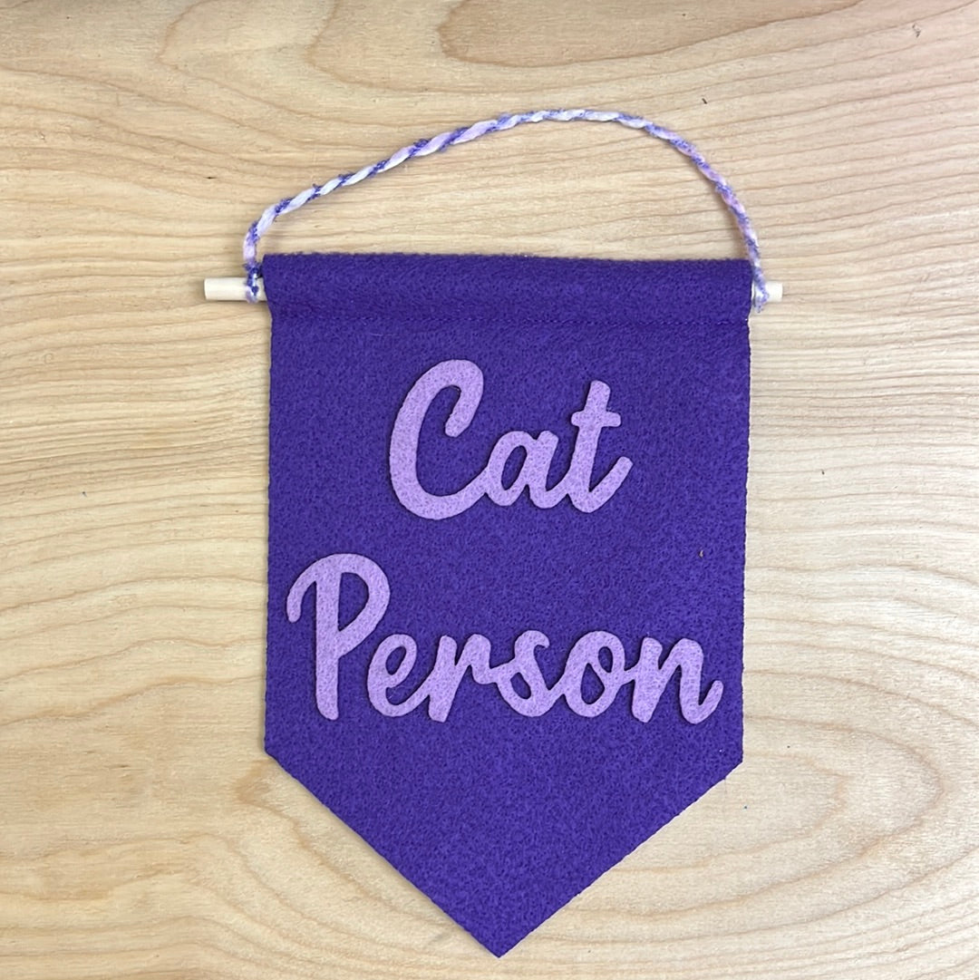 CAT PERSON SIGN